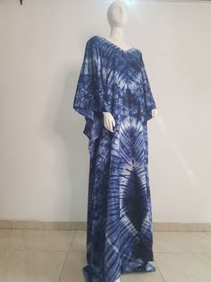 African print Silk Kaftan maxi dress is made with Polysilk and Lace Front. It can be styled in different ways, you can dress it up with high heels or dress down with flats/sneakers. Notice the slits.Other prints are also available, kindly start a conversation to ask for more information and pics.Contact us for custom looks and more style options. Sizing 🌺 Your height or desired kaftan length is needed. It is a free size but we still require your US/UK size and the length , and it can be adjuste Printed Floor-length Maxi Dress For Festivals, Blue Bohemian Long Dress, Blue Bohemian Maxi Dress, Blue Printed Long Maxi Dress, Bohemian Floor-length Batik Maxi Dress, Bohemian Floor-length Maxi Dress With Batik Print, Blue Floor-length Maxi Dress For Festival, Long Batik Print Dress For Spring, Spring Batik Print Maxi Length Kaftan