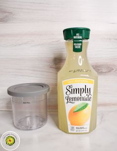 a bottle of gravy next to a container of yogurt