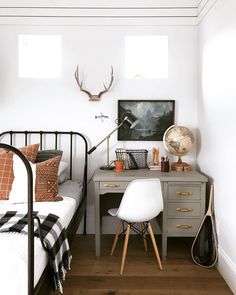 an instagram photo of a bedroom with a bed and desk