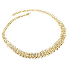 S link 5.00ctw Diamond Graduated Necklace in Yellow Gold Introducing this beautiful Diamond Fashion Necklace crafted in 10ky yellow gold. The chain features 5.00ctw diamonds in an "S" link design. The diamonds are I clarity and have a fancy light brown hue. The necklace measures 17" long and is 5.5 to 12mm wide. Weight is 33.15 grams. Diamonds, the birthstone for April, symbolize eternal love, strength, and invincibility. This necklace is a perfect blend of elegance and significance, making it a Fancy Light, Born In April, Collar Fashion, Graduation Necklace, Fancy Lights, Link Design, Gold Fashion Necklace, Necklace Craft, Tennis Bracelet Diamond