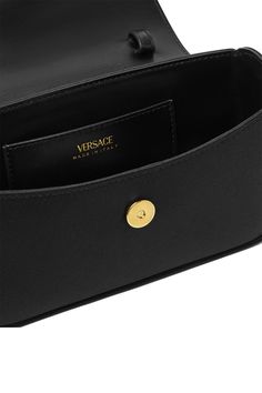 Versace la meduse mini bag in black/gold. Lining 1:100% AOS; Outside:28% SE, 72% VI 7.5" x 2" x 4.7" Made in Italy Black Modern Bag With Gold-tone Logo Plaque, Modern Black Bag With Gold-tone Logo Plaque, Modern Business Bags With Gold-tone Logo Plaque, Business Shoulder Bag With Gold-tone Logo Plaque, Designer Top Handle Shoulder Bag With Gold-tone Logo, Everyday Rectangular Flap Bag With Gold-tone Logo, Elegant Travel Shoulder Bag With Gold-tone Logo Plaque, Leather Clutch Bag With Gold-tone Logo Plaque, Modern Rectangular Bag With Gold-tone Logo Plaque