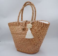 This straw is Personalized order and handwoven in the thailand from waterhyacinth for Bridesmaid Gift Wedding Party, Shopping Beach. Detail : Measures approximately Size D5 x W8 x H12 inches Top length of bag 19 inches drop length 7 inches If you are intersting of more drop length don't hesitate to contact us and ask I am here to serve you. SHIPPING: # Processtimes 7-10 days # We will be SHIPPED via THAI AIRMAIL and had TRACKING No. # Delivery Time 1-2 week We do offer WHOLESALE prices, large qu White Bohemian Open Weave Straw Bag, Handwoven Rattan Straw Bag For Beach Season, Beach Season Handwoven Rattan Straw Bag, Braided Rattan Straw Bag For Beach, White Natural Fiber Basket Beach Bag, Eco-friendly Braided Rattan Straw Bag, Braided Palm Leaf Straw Bag In Natural Color, Braided Natural Straw Bag Made Of Palm Leaf, Natural Handwoven Rattan Beach Bag