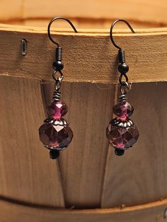 Black Plum Glass  looking so unique and stylish with the contrast of Lack Earwires and Beadcaps with the Plum Glass  beads. Love the Boho look and style!  Unique and stunning. I used lead-free and nickel free hypoallergenic earwire. Gift Wrapping is always included.  Please stop by my Etsy shop to see over 700 listings of personally designed and hand-made hair accessories and jewelry items. Black Plum, Please Stop, Boho Look, Handmade Earrings, Jewelry Earrings Dangle, Plum, Etsy Earrings, Glass Beads, Dangle Drop Earrings