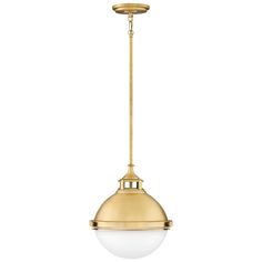 an antique brass finish pendant light with a white glass ball hanging from the ceiling,