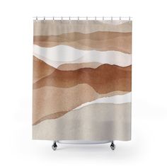 a shower curtain with a brown and white design on the front, in an abstract manner