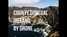 an aerial view of the coastline with text that reads county doneeal ireland by drone