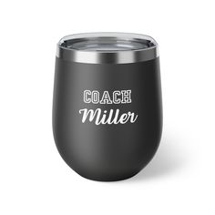 a black wine tumbler with the words coach miller on it