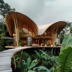 a large wooden building surrounded by greenery