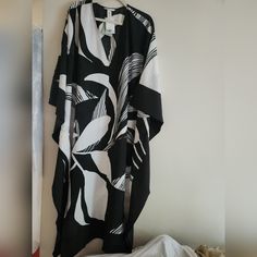 H&M Kaftan Dress Black/Cream Bnwt H&m White Maxi Dress For Beach, H&m Bohemian Maxi Dress For Summer, Black V-neck Casual Kaftan, Elegant Black V-neck Kaftan, Hm Black White Abstract Sweater, H&m White Beach Maxi Dress, Black Floral Print Dress, Black Printed V-neck Kaftan, Blue And White Striped Shirt