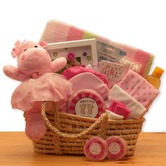 a basket filled with baby items on top of a table