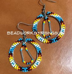 Hand Beaded Hoop Earrings approximately the size of a quarter Traditional Beaded Hoop Earrings, Beaded Hoop Earrings Native American Pattern, Native Beaded Hoop Earrings, Native American Hoop Earrings Beadwork, Traditional Multicolor Beaded Hoop Earrings, Native Beading, Beaded Hoop Earrings, Beaded Hoops, May 7