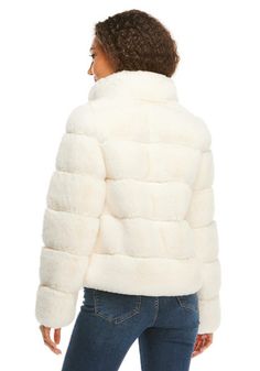 Cute, cuddly and cozy, our perfectly Posh Jacket has all the answers! Super soft and supple, Ivory sheared Mink is ideal for those who are searching for a compact fur that doesn't add bulk or overwhelm. Spare details, including a standup collar, concealed pockets and discretely positioned fur hook & ring closures, allow the spotlight to shine on the lush, plush pelted fur. A problem-solver, our Posh little 23" jacket solves the "what-do-I-wear-to-work-and-out-for-dinner" problem. Or the "how-do-I-keep-a-light-color-clean-if-I-wear-it-every-day" problem. Versatile and effortless, the Posh Jacket goes in early and works late--to the office AND after hours. True to its name,  It remains pristine perfect, thanks to the easy care option of machine wash/line dry. Winter White Faux Fur Coat For Cold Weather, Winter White Faux Fur Coat For Fall, Chic White Fluffy Outerwear, Cream Faux Fur Coat With Faux Fur Lining, Cream Fur Coat With Faux Fur Lining, Winter White Faux Fur-lined Outerwear, Winter White Faux Fur Outerwear With Lining, Cream Faux Fur Coat For Winter, Cozy White Fur Coat With Faux Fur Lining