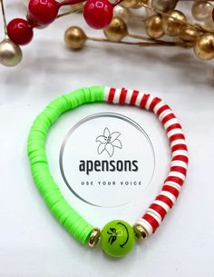 Get in the Christmas spirit with this Grinch bracelet! Make it extra cute by adding the green, red, white & gold disk bracelet to make it more festive! I currently offer bracelet lengths from 4" to 9.5". What I recommend to help you better understand sizing is to measure your wrist and add on .25" and that's the size bracelet that will fit the best. Example: A wrist that measures 6.5" around would order a size 6.75" bracelet. However, if you like your bracelets a little bit loser, I would add on an entire inch. Example: A wrist that measures 6.5" around would order a size 7" bracelet.  These bracelets are made with a stretchy string but it's still important to order the right size so it can slip over your hand easy. I am happy to make custom sizes, switch up colors, wording, whatever you w Fun Green Stretch Bracelet With Letter Beads, Green Stretch Bracelet With Letter Beads In Fun Style, Green Novelty Bracelets With Round Beads, Green Beaded Bracelet For Holiday, Adjustable Green Jewelry For Holidays, Adjustable Green Jewelry For Holiday, Green Novelty Jewelry With Letter Beads, Adjustable Green Beaded Bracelets For Holiday, Christmas Green Beaded Bracelets