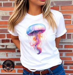 Watercolor Jellyfish T-shirt, Unisex T-shirt, festival tshirt, watercolor Tee, Tshirt art, Jellyfish tee, Animal Tee, Jellyfish tshirt Introducing our Animal T-Shirt, a delightful blend of comfort and style for animal lovers everywhere. Crafted with care, this t-shirt features a captivating animal design that is sure to capture hearts. Each animal is beautifully illustrated, showcasing their unique characteristics and charm. Made from soft, breathable fabric, this t-shirt offers a cozy fit that Tie Dye T-shirt With Sublimation Print For Summer, Summer Tie Dye T-shirt With Funny Print, White Watercolor Print Short Sleeve T-shirt, Casual White T-shirt With Watercolor Print, Artistic White Summer T-shirt, Summer Graphic Tee With Watercolor Print, Summer Watercolor Print Short Sleeve T-shirt, Summer Short Sleeve T-shirt With Watercolor Print, Short Sleeve Summer T-shirt With Watercolor Print