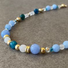 "Blue Apatite& Aquamarine & Moonstone & Quartz Bead Necklace ☆ Aquamarine and apatite are stone of courage.  Its calming energies reduce stress and quiet the mind.  Stones have an affinity with sensitive people.  They can invoke tolerance of others and overcomes judgmentalism, giving support to those overwhelmed by responsibility.  ☆ For the bracelet: https://www.etsy.com/listing/1472932795/blue-aquamarine-bracelet-men-blue ☆ Along with this necklace you have bought, an earring that matches its color is also a gift! ☆ Arrives ready for gifting and usually ships same day or next day. The necklace will be sent with a gift! O T H E R ∙ I N F O R M A T I O N Blue Apatite size: 5-6mm Blue Aquamarine size: 8 mm Moonstone size: 5-6 mm White Auqrtz size: 3-4 mm **Intermediate apparatus and beads a Blue Amazonite Gemstone Beads Necklace, Blue Amazonite Round Bead Necklaces, Adjustable Blue Amazonite Beaded Necklaces, Blue Amazonite Beaded Necklace With Polished Beads, Blue Amazonite Polished Beads Necklace, Blue Faceted Bead Gemstones For Gifts, Blue Faceted Beads Gemstones For Gifts, Blue Apatite Round Bead Necklaces, Blue Amazonite Spiritual Necklaces