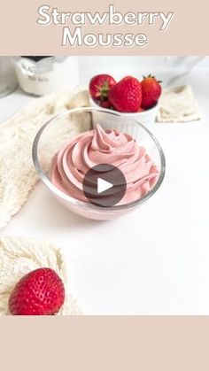 strawberry mousse in a bowl with strawberries on the side