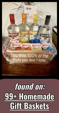 the gift basket is filled with alcohol bottles