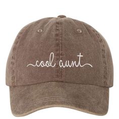 Details Show your aunt some love with this cool aunt baseball hat. Or are you the cool aunt then rock this washed cap with the perfect message and is a wardrobe need. Size + Fit - Unisex washed dad hat embroidered with Cool Aunt- Adjustable, strap with antique buckle for custom fit- Low profile, unstructured, 6-panel- Head circumference: 20 ½” - 21 ⅝” Content + Care - 100% Cotton- Hand wash cold- Embroidered in sunny Los Angeles, California with love Shipping & Returns - We ship next day Mon Aunt Vibes, The Cool Aunt, Wash Baseball Cap, Cool Aunt, How To Wash Hats, Aunt Life, Embroidered Baseball, Embroidered Baseball Caps, Embroidered Hats