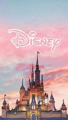 disney castle with the word disney written on it in front of an orange and pink sky