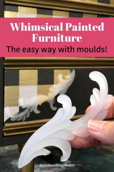 someone is painting furniture with white paint