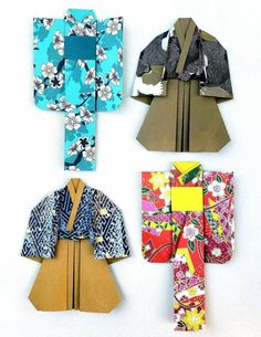 four different types of kimonos are arranged on a white surface and one is folded up