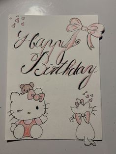 a happy birthday card with hello kitty and mouse on the front, in black ink