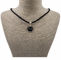 Lightweight and unique, Black Obsidian heart necklace. A gorgeous gift for a Birthday, Valentine's Day, Christmas or any special occasion.  A versatile necklace that can be worn daytime or evening, dress up or dress down. The black semi-precious Rainbow Obsidian heart bead is threaded onto a sterling silver bail and attached to black faux suede cord to make a gorgeous choker style necklace. The necklace fastens at the back with a sterling silver bolt ring clasp and features a 2 inch sterling sil Black Charm Necklaces As Gift, Elegant Black Heart Necklace For Parties, Black Jewelry For Valentine's Day Gift, Black Necklace For Anniversary On Valentine's Day, Black Double Heart Jewelry Gift, Black Heart Pendant Necklace As Gift, Black Double Heart Jewelry For Gifts, Black Double Heart Necklace For Anniversary, Valentine's Day Gift Black Charm Necklace