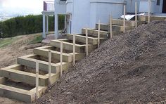 an image of some stairs in the dirt