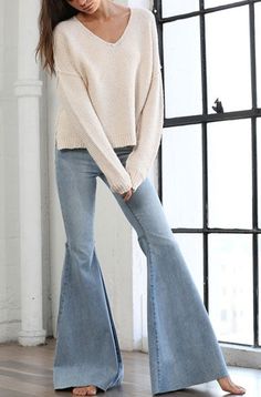 The perfect flare with raw hem bottom. Cut the bottoms to your desired length. Super comfy and stretchy. + 72% Cotton, 27% Polyester, 1% Spandex+ 16.5" leg opening (flat)+ 9.5" Front rise+ 12" Waist (flat across)+ 31" Inseam Bottom Light, Light Denim Jeans, Light Flare, Favorite Boots, Bell Bottom, Chunky Sweater, Light Denim, Fitness Inspo, Bell Bottom Jeans