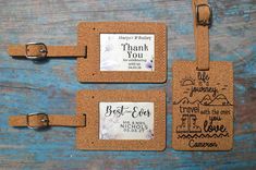 three luggage tags with handwritten words on them