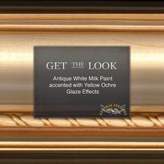 an antique white milk paint accented with yellow odoue glaze effects is displayed