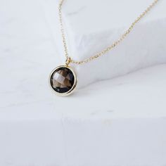 Dainty smoky quartz necklace in 14K solid gold. Simple and dainty necklace for women who love colors. The best gift for her. 100% handcrafted with love! PRODUCT DETAILS ● Material: 14K solid gold - white gold - rose gold ● Gemstone: Smoky Quartz, round briolette cut ● Stone Diameter: 10mm (0.4in) ● Length: 42cm (16.5in) to 45cm (17.5) HOW TO ORDER - CUSTOM ORDERS ●Choose from the drop down menus the available options (Metal, Length) and leave us a note for any special requirements. ●For special Smoky Quartz Yellow Gold Jewelry Gift, Yellow Gold Smoky Quartz Jewelry Gift, Elegant Gold Smoky Quartz Necklace, Elegant Smoky Quartz Jewelry For Anniversary, Luxury Smoky Quartz Jewelry Gift, Smoky Quartz Pendant Necklace Gift, Smoky Quartz Pendant Necklace For Gift, Elegant Gold Jewelry With Smoky Quartz, Classic Smoky Quartz Jewelry As A Gift