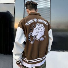 Spruce up your looks by adding the Time is Money varsity jacket to your wardrobe. This unisex brown letterman jacket has a relaxed fit with embroidery on the front and back. Hip Hop Street Fashion, Hip Hop Fashion 90s, Streetwear Jackets, Streetwear Mode, Varsity Jacket Men, Baseball Varsity Jacket, Leather Sleeves, Wrap Jacket, Letterman Jacket