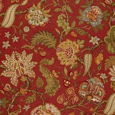 an image of a red and gold floral pattern on fabric or upholstered material