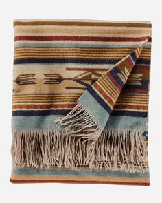 a multicolored blanket with fringes on it