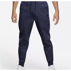 Elevate Your Activewear Game With These Nike Tech Sportswear Fleece Joggers In Midnight Navy. These Joggers Are Perfect For Any Occasion, Whether You're Hitting The Gym Or Running Errands. Made With A Regular Fit And Size Type, These Pants Are Designed For Men Who Want To Feel Comfortable And Stylish. The Xl Size Ensures A Perfect Fit For Those Who Need A Little Extra Room. These Pants Come In A Beautiful Blue Color And Feature A Jogger Style That Is Both Trendy And Functional. The Fleece Fabric Type Ensures That You Stay Warm And Cozy, While The Nike Tech Fleece Product Line Guarantees High Quality. With A Model Number Of Cu4495-410, These Pants Are A Must-Have For Any Nike Enthusiast. Get Blue Fleece Bottoms For Winter, Winter Blue Fleece Bottoms, Nike Blue Athleisure Sweats, Nike Blue Sweats Athleisure Style, Nike Blue Sweats For Loungewear, Blue Sportswear Sweats, Blue Jogging Sweats With Pockets, Blue Sporty Sweats With Pockets, Blue Sweats With Pockets For Jogging