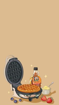 a waffle iron with syrup and other items on it next to the waffle