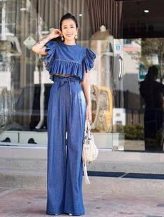 Chic Elegant and relaxed style with our matching Denim Set.- Layered Flounce Top- High waist Wide leg - Bow detail at frontPlease note you can ask us to adjust any of the measurements for our standard sizes listed below. Size 0Bust  30"  / 76 cmWaist 23.5"/ 60 cmHip   33"  / 84 cmThigh 19.5"/ 50 cmInseam 31" / 79 cmSize 2Bust  30"  / 76 cmWaist 25"  / 64 cmHip   34.5"/ 88 cmThigh 19.5"/ 50 cmInseam 32" / 81 cmSize 4Bust  32"  / 80 cmWaist 26"  / 66 cmHip   36.5"/ 92 cmThigh 20"  / 51 cmInseam 32 70s Mode, Thai Silk Dresses, Paper Bag Pants, Denim Set, 70s Vintage Fashion, Bag Pants, High Waisted Wide Leg Pants, Flounce Top, Pants Vintage