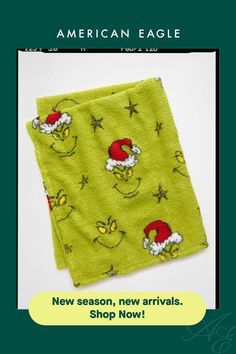 a green towel with santa claus on it and the words new season, new arrivals shop now