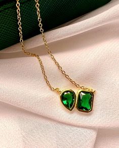 Elegant Green Rectangular Necklaces, Elegant Green Rectangular Necklace, Gold Emerald Necklace For Her, Elegant Dangle Emerald Necklace Gift, Elegant Drop Emerald Necklace For Gift, Elegant Gold-plated Emerald Clavicle Necklace, Green Jewelry With Adjustable Chain For Anniversary, Green Drop Necklaces In Fine Jewelry Style, Elegant Teardrop Emerald Necklace Gift