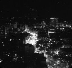 an aerial view of a city at night