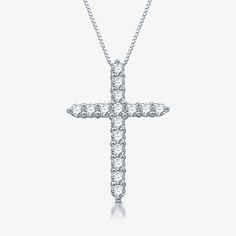 This women's cross pendant necklace adds sophisticated glamor to any outfit. Made from Sterling Silver, it features a classic design with round-cut Lab-Grown Diamonds prong set into a cross shaped pendant. Features: Certified Diamonds, Religious Jewelry, In A Gift BoxDiamond Clarity: I2-I3Jewelry Closure: Spring Ring ClaspLink Construction: SolidSetting: ProngShape: CrossStone Cut: RoundDiamond Color: G-HMetal Color: WhiteChain Length: 18 InchPendant Length: 22.2mmPendant Width: 15.8mmRounded Ca White Diamond-cut Pendant Cross Necklace, White Diamond Cut Pendant Cross Necklace, Elegant White Crucifix Necklace, White Cubic Zirconia Crucifix Jewelry, White Diamond Crucifix Necklace, Diamond White Brilliant Cut Cross Necklace Gift, Sterling Silver Cross Necklace With Brilliant Cut For Gift, Diamond White Brilliant Cut Cross Necklace As Gift, Diamond White Diamond Cut Crucifix Necklace