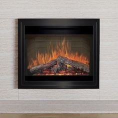 an electric fireplace with fire logs in it