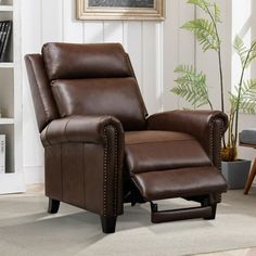 a brown recliner chair in a living room