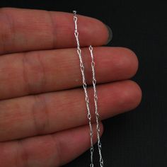 The last picture shows the rhodium plated chains. It looks like slightly oxidized chains. Material: 925 sterling silver, and rhodium Plated over sterling silver Size: 6.7 mm * 1mm Quantity : 3 feet Product Code: 101007 This chain is available in: Gold plated Sterling Silver: https://www.etsy.com/listing/480632251 Rhodium Sterling Silver: https://www.etsy.com/listing/467143886 How to Finish All you need to finish this chain to a ready to wear piece of jewelry: Jumprings: https://www.etsy.com/list Extra Long Necklace, Twisted Chain, Sterling Silver Anklet, Wire Necklace, Sterling Silver Chain Necklace, Silver Anklets, Chain Silver, Foot Jewelry, Chain Jewelry