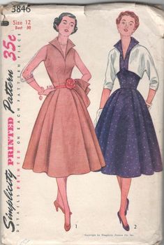 two women's dresses, one in pink and the other in blue with polka dots