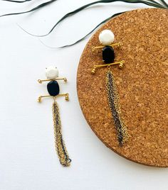 Black and White Long Tassel Statement Dangle Earrings with Gold Chains - Gemstone Jewelry by TheEnache on Etsy Elegant Black Jewelry With Latkans, Black Tassel Earrings As Gift, Black Tassel Earrings For Gift, Elegant Black Danglers With Latkans, Black Latkans Earrings For Gift, Elegant Black Danglers For Gift, Indian Rings, Multiple Earrings, Colorful Earrings