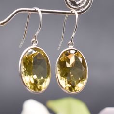 Natural Citrine Drop Earrings, Faceted Oval Earrings, Gemstone Jewelry, 925 Sterling Silver, Dangle August Birthstone Gift, Silver Earrings Description :- Metal :- 925 Sterling Silver/ 18k Gold Filled  Gemstone :- Natural Citrine  Stone Shape :- Oval  Stone Color :- Yellow  Handmade Items **Made to Order** Delivery Time :- Once Item is shipped parcel will delivered to you in 2-4 weeks. C U S T O M I Z E O R D E R  All jewelry are made with solid 925 sterling silver. If you want to make any chang Oval Gemstone Teardrop Earrings As Gift, Oval Faceted Earrings As Gift, Oval Teardrop Earrings For Anniversary, Oval Crystal Earrings For Formal Occasions, Oval Faceted Earrings For Gift, Nickel-free Oval Teardrop Earrings, Silver Oval Faceted Earrings, Oval Sterling Silver Crystal Earrings, Silver Faceted Oval Earrings