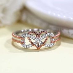 Anchor Ring In Rose Gold Silver Infinity Heart Shaped-VANCARO Rose Gold Butterfly Promise Ring, Luxury Rose Gold Infinity Jewelry, Elegant Rose Gold Butterfly Promise Ring, Rose Gold Cubic Zirconia Butterfly Ring For Anniversary, Rose Gold Butterfly Ring For Anniversary, Anniversary Rose Gold Butterfly Ring With Cubic Zirconia, Elegant Rose Gold Butterfly Ring, Luxury Rose Gold Butterfly Ring Perfect For Gift, Luxury Rose Gold Butterfly Ring As Gift