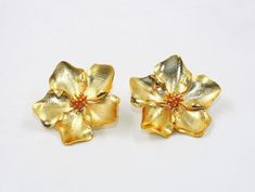 1 Pair 22kt Gold Plated Designer Flower Earrings / 42mm Handcrafted Flower Earrings / Wedding Jewelry / Gift For Her / Bridesmaid Earrings. Item Name: Designer Flower Earrings Earrings Length: 42mm approx Metal: 22kt Gold Plated Brass Qty: 1 Pair Click here to check more of our pearl earrings:- https://www.etsy.com/in-en/shop/RareGemsNJewels?ref=seller-platform-mcnav&search_query=natural+pearl+earrings Click here to check more of our gemstone earrings:- https://www.etsy.com/in-en/shop/RareGe Gold Flower Earrings With 3d Flowers, Formal Gold Jewelry With Flower Decoration, Gold Flower-shaped Earrings For Anniversary, Gold Flower-shaped Anniversary Earrings, Formal Yellow Flower-shaped Earrings, Yellow Gold Flower Charm Earrings For Wedding, Gold Jewelry With 3d Flowers For Wedding, Gold Flower-shaped Earrings For Formal Events, Gold Bridal Earrings With 3d Flowers